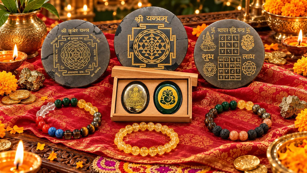 Dhanteras and Diwali puja setting with SunSutra Kuber, Shree and Vyapar Vriddhi Yantras on pyrite, the Lakshmi Ganesha coin set and crystal bracelets