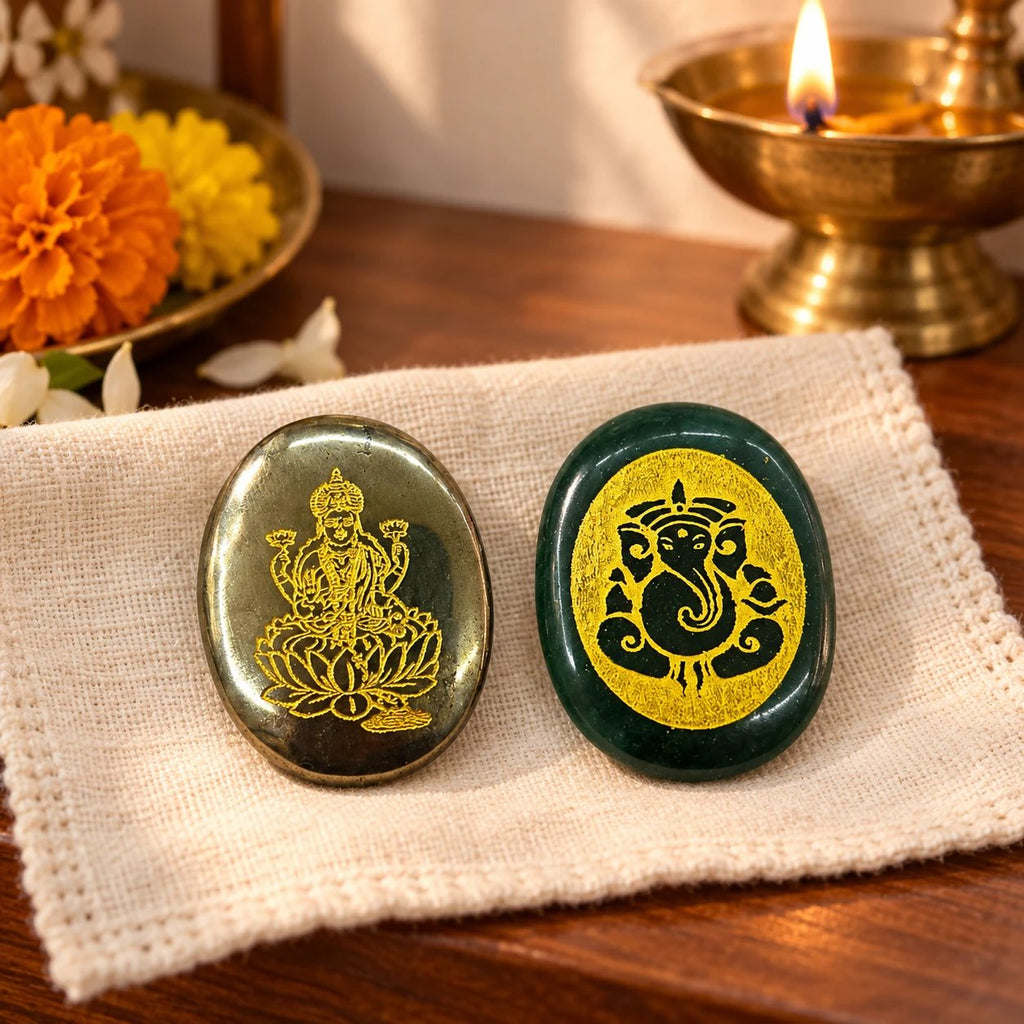 Lakshmi Ganesha coin set: Pyrite Lakshmi coin and Green Aventurine Ganesha coin with a diya