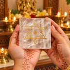 Shiv Shakti sphatik yantra held in two hands, showing its size