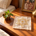 Shiv Shakti sphatik yantra on a couple's bedside table with tulsi